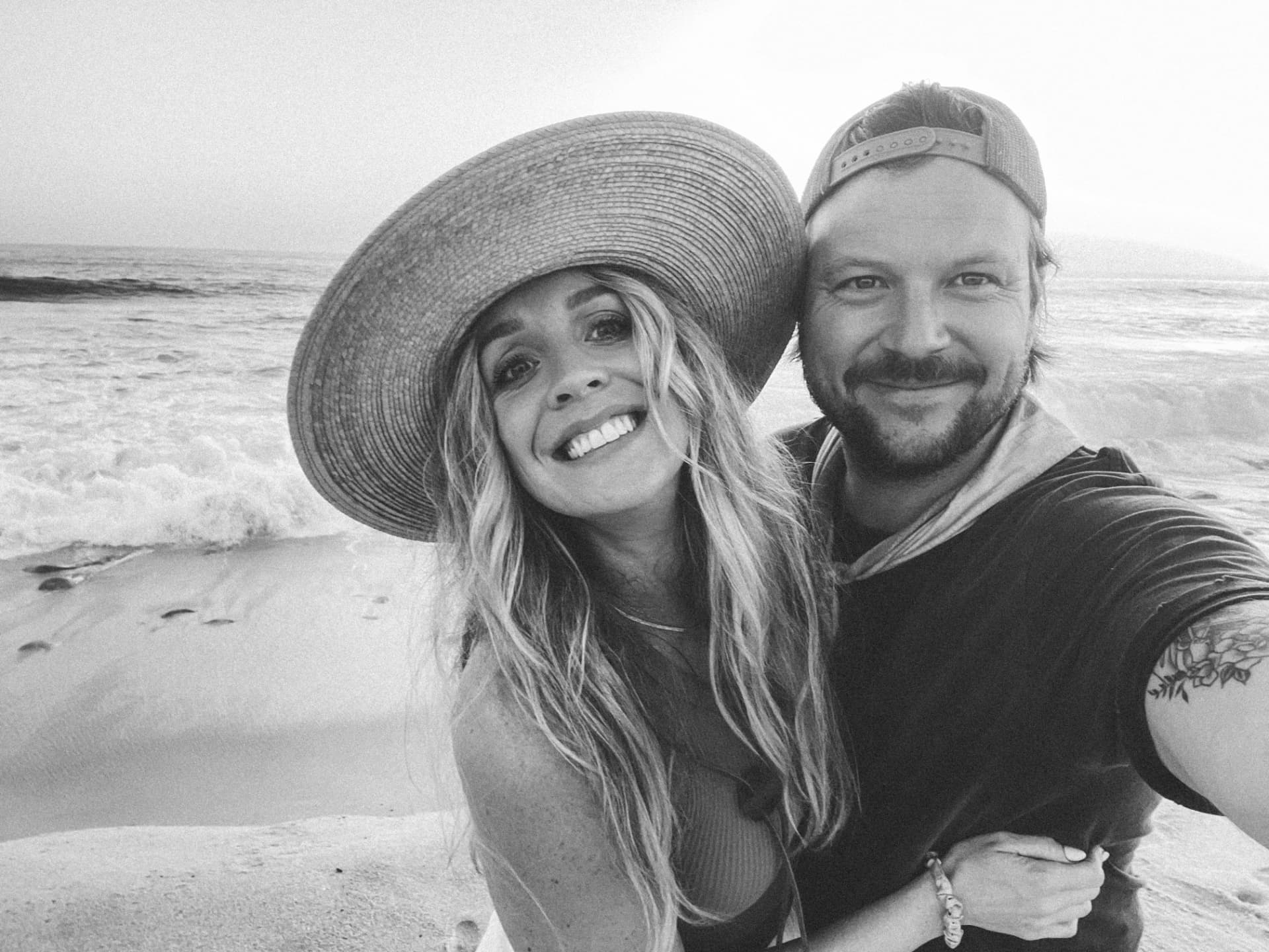 Ryan and his wife on the beach